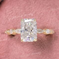 an engagement ring with a cushion cut diamond