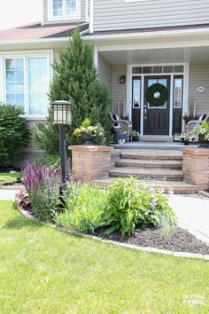 a house with landscaping in the front yard