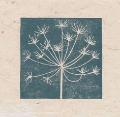 an image of a dandelion in blue and white on a piece of paper