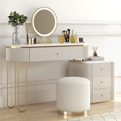 a dressing table with a mirror, stool and other items on it in a white room