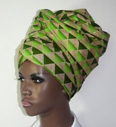 This wrap is made from a beautiful Wooding  African print fabric, in shades of green and gold. Pair with your matching outfit and be a hit.https://www.etsy.com/listing/187378561/fya-volume-cap-with-anti-slip-headband?ref=shop_home_active_14Wrap in your desired style.100% CottonWoodingHand wash / Machine wash Handmade in USA Elegant Green Headwrap For Party, Elegant Green Festive Fabric, Elegant Green Fabric For Festive Occasions, Traditional Green Turban, Green Bohemian Turban, Green Bohemian Turban One Size, Fitted Green Festive Fabric, Bohemian Green Adjustable Headwrap, Fitted Green Fabric For Festive Occasion