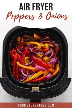 Overhead view of raw onion and pepper slices in an air fryer basket. How To Dehydrate Peppers In Air Fryer, Air Fryer Fajita Vegetables, Peppers And Onions In Air Fryer, Air Fryer Peppers And Onions, Air Fryer Bell Peppers, Air Fryer Peppers, Airfryer Ideas