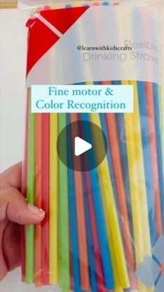 a person holding up a bag of fine motor and color recognition straws