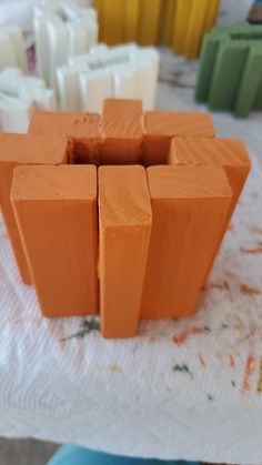 a wooden block sitting on top of a table