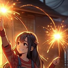 a girl holding sparklers in her hand