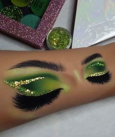 Green Carnival Makeup, Green Christmas Eye Makeup, Juneteenth Makeup Looks, Green And Gold Makeup Looks Black Women, Dinosaur Makeup Women, Red And Green Eye Makeup, Green And Red Makeup, Princess And The Frog Makeup, Gold And Green Makeup