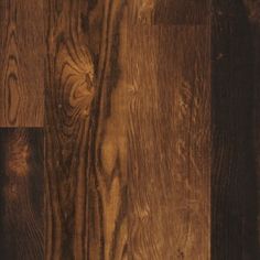 wood flooring with different colors and patterns on the wooden planks in this photo