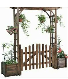 a wooden arbor with potted plants on it