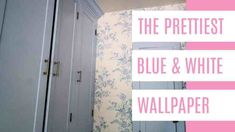 the prettiest blue and white wallpaper is next to a gray cabinet with pink trim