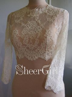 split Vintage lace bridal tops with long sleeves. 1.Material:Lace 2.Picture Color:Ivory 3.Embellishment:Lace Applique 4.Closure:Buttons 5.Sleeve:Long Sleeves 6.Size:Customized Measurements we need: Bust:________inch/cm Waist:________inch/cm Armhole:________inch/cm Arm girth:________inch/cm Arm length:________inch/cm Shoulder to shoulder:________inch/cm Shoulder to bottom:________inch/cm Bolero Jacket Wedding, Bridal Bolero, Bolero Wedding, Lace Bolero, Bridal Tops, Bridal Jacket, Bridal Shawl, Wedding Cape, Wedding Jacket