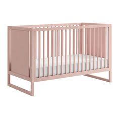 a pink crib with white sheets on the bottom and side, in front of a white background