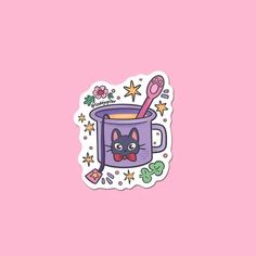 a sticker with a cat in a mug