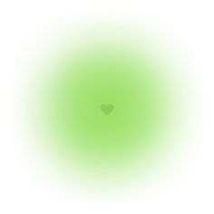 a green circle with a heart in the center on a white background that appears to be blurry