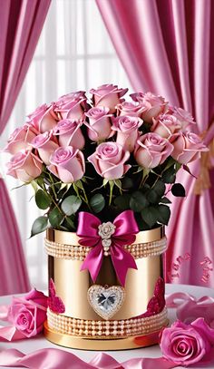 a large bouquet of pink roses in a gold box with a heart on the lid