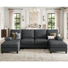 a large gray sectional sofa in a living room