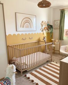 a baby's room with an animal themed crib