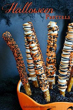 halloween candy sticks with sprinkles and candies