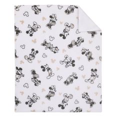 the mickey mouse blanket is shown with black and white prints on it, which are all over