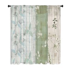 an image of curtains with flowers on them