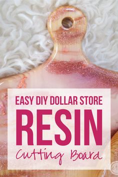 a bottle with pink glitter on it and the words easy diy dollar store resin cutting board