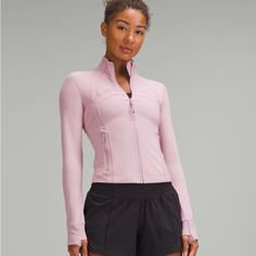 Lululemon Define Cropped Jacket * Nulu Size 6 Nwt Color : Rose Blush Whether You're Up For Adventure Or Ready For Downtime, This Shortened Version Of Our Fan-Favourite Define Jacket Has A Feel-Good Fit That Can Do It All. Designed For Casual Slim Fit, Waist Length Skims Your Body Not Too Short, Not Too Long, Just Right Around The Waistband Product Features Secure Front Pockets Thumbholes And Cuffins Keep Sleeves Down And Chills Out Back Vent Strategically Placed To Provide Airflow Locker Loop Fo Lululemon Cropped Define Jacket, Lulu Define Jacket, Lululemon Tote Bag, Free Lululemon, Lululemon Define, Lululemon Define Jacket, Define Jacket, Lululemon Jacket, Rose Blush