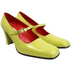 - Vintage 90s Celine green leather mary jane shoes. The colourful combination with red interior is very original and vintage like. One of a kind! - Featuring gold toned "Celine" buckle closure. - Made in France. - Size 37. Retro Mary Janes With Buckle Closure For Formal Wear, Retro Formal Mary Janes With Buckle Closure, Formal Retro Mary Janes With Buckle Closure, Retro Green Closed Toe Heels, Green Retro Closed Toe Heels, Green Closed Toe Retro Heels, Green Leather Retro Heels, Retro Green Leather Heels, Combination With Red