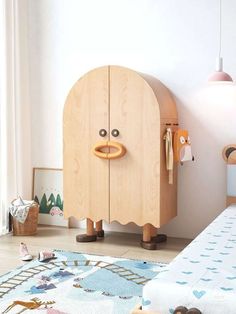 a child's bedroom with wooden furniture and toys