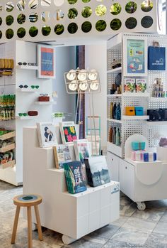 the inside of a store with lots of items on display