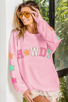 Oh howdy there! Our Howdy Pink Stars Lightweight Sweatshirt is the perfect cozy piece to brighten up your look - with stars patches on the sleeves, you'll be shining like the star you are! This lightweight, loose-fit top will have you feeling comfy-cozy in no time. Yeehaw!! Iron On Patch Sweatshirt Ideas, Iron On Patches Ideas Sweatshirt, Cute Iron On Patches Sweatshirt Ideas, Chenille Letter Sweatshirt Ideas, Patch Sweatshirt Ideas, Diy Iron On Patches Sweatshirt, Iron On Patches Ideas Clothes