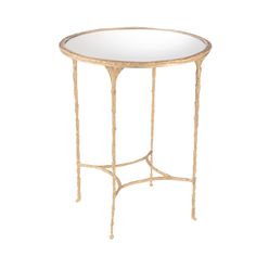 an oval glass table with gold metal legs and a circular mirror on the top, against a white background