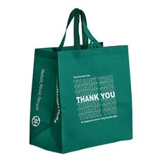 a green shopping bag with the words thank you