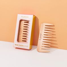 Looking for an eco-friendly hair comb that gently detangles your hair and is gentle on scalp? Look no further than our Wooden Wide Tooth Comb. Made from natural and sustainable beech wood, this anti-static comb effortlessly glides through hair with ease. Its wide-toothed design makes it ideal for detangling and styling, and it's perfect for use on wet hair. Plus, the beech wood material is recyclable, making it a great choice for those looking to reduce waste. The Wooden Wide Tooth Comb measures Sustainable Ideas, Eleven Australia, Cosmetic Photography, Wooden Comb, Cosmetics Photography, Wide Tooth Comb, Hair Brands, Hair Product, Book Design Layout