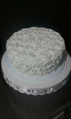 a white cake sitting on top of a table