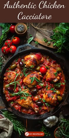 a pan filled with chicken and vegetables on top of a wooden table next to tomatoes