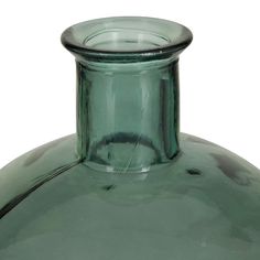 "Get the Green Recycled Glass Handmade Spanish Vase 13\" x 13\" x 17\" at Michaels. com. Give your home a personalize touch and bring your creative vision to life. Decorate with ease with our eclectic range of home decor. Decorate with fun with Iris And Ivory Features a modern style inspired by a minimalistic design with clean lines and angular structures. Product is made of pure glassware for a robust and long lasting display. This small gourd vase features a dark green glass finish. Our captiv Gourd Vase, Recycled Glass Vase, Picked Flowers, Green Glass Vase, Green Vase, Freshly Picked, Minimalistic Design, Recycled Glass, Mosaic Glass