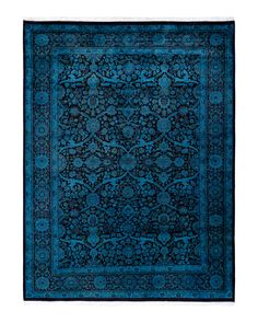 a blue rug with an intricate design on it