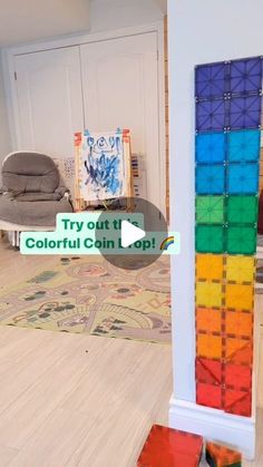 there is a room with many different colored blocks on the floor and in front of it