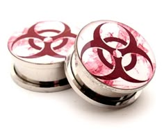 two red and white buttons with biohazard symbols on them, sitting next to each other