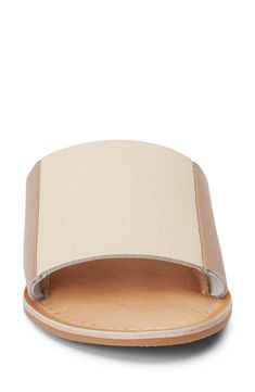 Colorblocking is always cool as this sun-ready sandal attests with a two-tone strap crafted from smooth leather. Leather upper and lining/synthetic sole Imported Leather Slides For Beach In Summer, Leather Slides For Summer Beach, Leather Slides For Summer Beach Outings, Summer Leather Beige Mules, Summer Beige Leather Mules, Chic Natural Leather Sandals, Leather Sandals With Leather Trim For Spring, Beige Leather Mules With Cushioned Footbed, Beige Leather Mules With Removable Insole