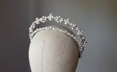 Bridal double crown with pearls and crystals. Wedding pearl tiara. Kokoshnik   Available with white or ivory/cream pearls (in menu) ~MATERIALS~ -Austrian crystals (color White clear) -Austrian white pearl beads -Silver tone filigree ~SIZE~ Center height  2 inch (5 cm) ~SHIPPING AND DELIVERY TIME~ This headpiece is ready to ship by 3-5 days The approximate time of shipment: - 10-16 days to Europe - 15-35 days to United States and other countries. ~IMPORTANT INFORMATION~ -Please allow as much time for shipping as possible before your important date ! I can't guarantee shipping time as its beyond my control.  -Rush orders available for a fee. I use EMS express post. Please contact me. ~CUSTOM DESIGN~ If you interesting custom design please message me. I will create something special for you w Crown With Pearls, White Tiara, Snow White Wedding, Tiara Silver, Pearl Crown, Crystals Wedding, Hummingbird Cake, Pearl Tiara, Tiara Bridal