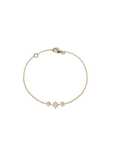 Delicately suspended from a thin yellow gold chain is a bar necklace of pavé set diamond stars soldered together. Inspired by the Northern Star, this shimmering & whimsical bracelet adds a brilliant touch to both day and evening wear. Details Bar total width is approximately 22mm / .85" wide. The longest point is approximately 8mm / .3" at largest star Necklace fastens with a lobster clasp and has a 25mm / 1'' adjustment Diamond carat weight 0.1 14K yellow Gold Northern Star, Bar Bracelet, Star Chain, Bracelet Ideas, Star Bracelet, Diamond Star, Bar Bracelets, Diamonds And Gold, Yellow Gold Chain