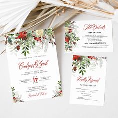 wedding stationery with red flowers and greenery