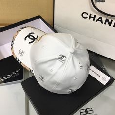 SHOP MORE LUXURY PRODUCTS HERE Description Chanel Cap White Chanel branded Cap with a dynamic and youthful design WhiteWhite FabricCC Logo Includes box, dust bag.This product is of the premium quality. Luxury White Snapback Hat, Designer White Visor Baseball Cap, Designer White Snapback Hat, Luxury White Baseball Cap, Designer White Visor Hat, White Baseball Cap With Logo Print, White Baseball Cap With Logo Print And Curved Visor, White Baseball Cap With Logo And Curved Visor, Luxury White Visor Hat