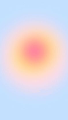 an orange and pink circle on a blue background