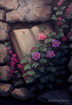 an open book sitting on top of a pile of rocks with flowers growing out of it