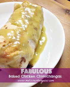 a close up of a plate of food with meat and cheese on it that says fabulous baked chicken chimichangas