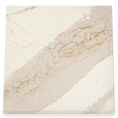 a marble tile with white and beige stripes on the bottom, in an irregular pattern