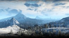 a snowy mountain landscape with trees and mountains in the distance, under a cloudy sky