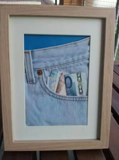 an image of money sticking out of the back pocket of a jeans pocket