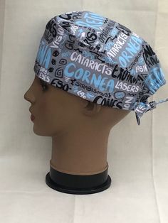 Unisex or Men's Scrub Hat-Ophthalmology Scribbles-Will be made like the Scrub Hats shown-pattern placement will vary ♥NO RETURNS or REFUNDS or EXCHANGES♥ Sizing Reference: Mannequin bald head circumference is 22.25 inches STYLES: -Regular with no elastic: Regular Unisex scrub hat approximately 22.75 inches around with ties -Regular with elastic: Regular Unisex scrub hat approximately 22.75 inches around with ties -Euro with elastic: Euro Unisex scrub hat approximately 24 inches around with ties Side By Side Pictures, Side Picture, Mens Scrubs, Bald Heads, Bald Head, Scrub Caps Surgical, Surgical Caps, Size Comparison, Scrub Hat